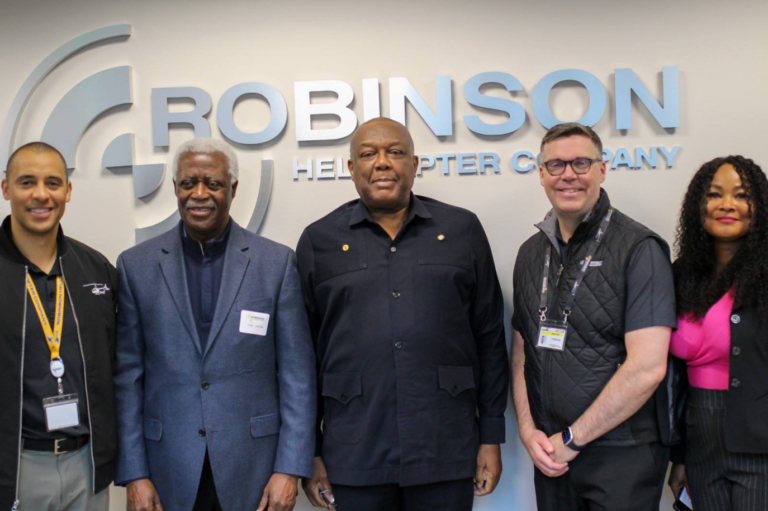 AMBASSADOR VICTOR EMMANUEL SMITH VISITS ROBINSON HELICOPTER COMPANY